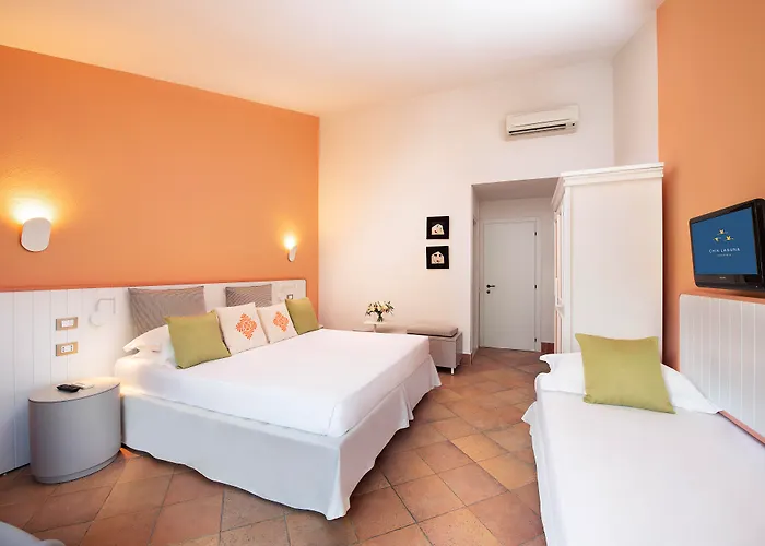 Курортный комплекс The Village Laguna Sardinia Киа