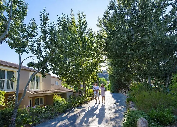 Курортный комплекс The Village Laguna Sardinia Киа