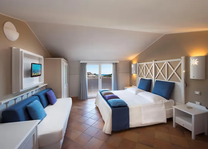 Курортный комплекс The Village Laguna Sardinia Киа