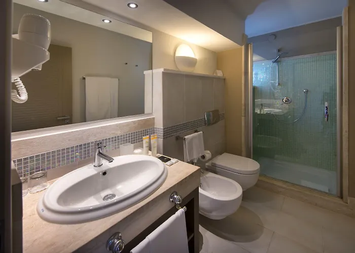 Курортный комплекс The Village Laguna Sardinia Киа