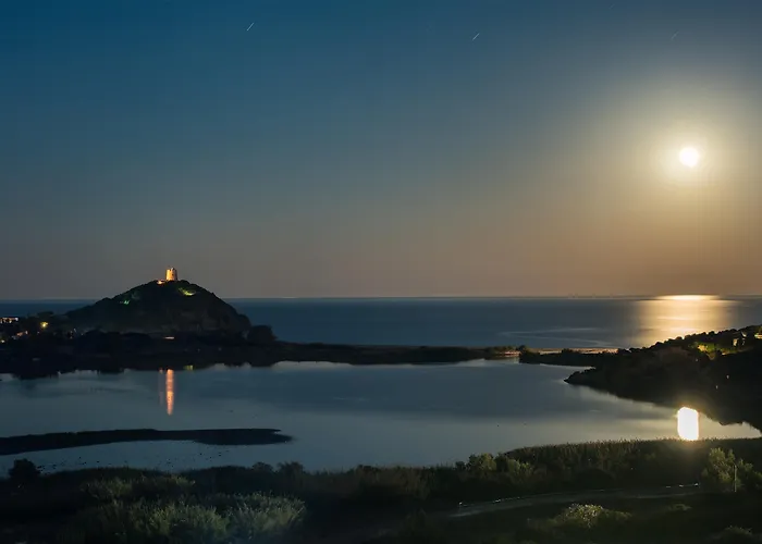 Курортный комплекс The Village Laguna Sardinia Киа